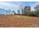 Exterior view of the mobile home and yard at 2124 Mcbrayer Springs Rd, Shelby, NC 28150