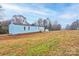 Front view of a light blue mobile home on a large lot at 2124 Mcbrayer Springs Rd, Shelby, NC 28150