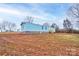 Light blue single-wide mobile home with a wooden deck at 2124 Mcbrayer Springs Rd, Shelby, NC 28150