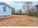 Side view of a light blue mobile home with a yard at 2124 Mcbrayer Springs Rd, Shelby, NC 28150