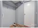 Laundry room featuring wire shelving and space for washer and dryer at 2124 Mcbrayer Springs Rd, Shelby, NC 28150