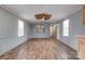 Spacious living room featuring wood-look floors and gray walls at 2124 Mcbrayer Springs Rd, Shelby, NC 28150