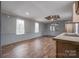 Living room with wood-look floors and a gray and white color scheme at 2124 Mcbrayer Springs Rd, Shelby, NC 28150