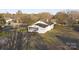 Elevated view of a white house with a large yard and driveway at 304 Gold Hill Ave, Rockwell, NC 28138