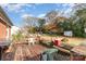 Wooden deck with seating area overlooks a large backyard at 327 Woodside Dr, Shelby, NC 28150