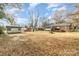 Large backyard with shed and mature trees at 327 Woodside Dr, Shelby, NC 28150