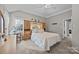 Bright bedroom with a comfortable bed and built-in storage at 3528 Briarthorne Dr, Charlotte, NC 28269