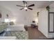 Bedroom with two twin beds, ceiling fan, and calming decor at 3703 Old Pageland Marshville Rd, Wingate, NC 28174