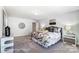 Spacious bedroom with carpeted floors and natural light at 4141 Black Ct # 171, Harrisburg, NC 28075