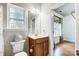 Simple bathroom with single sink vanity and a toilet at 417 Stowe Rd, Belmont, NC 28012