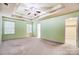 Spacious bedroom with green walls and walk-in closet at 417 Stowe Rd, Belmont, NC 28012