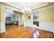 Formal dining room with hardwood floors and chandelier at 417 Stowe Rd, Belmont, NC 28012