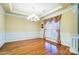 Formal dining room with hardwood floors and window at 417 Stowe Rd, Belmont, NC 28012