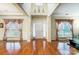 Two-story entryway with hardwood floors and high ceilings at 417 Stowe Rd, Belmont, NC 28012