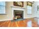 Living room fireplace with decorative vases at 417 Stowe Rd, Belmont, NC 28012
