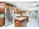 Island kitchen with granite countertops and stainless steel appliances at 417 Stowe Rd, Belmont, NC 28012