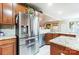 Stainless steel appliances and granite countertops in this lovely kitchen at 417 Stowe Rd, Belmont, NC 28012