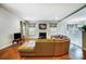Spacious living room with hardwood floors and a sectional sofa at 417 Stowe Rd, Belmont, NC 28012
