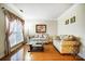 Living room with hardwood floors and two sofas at 417 Stowe Rd, Belmont, NC 28012