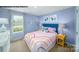 Charming bedroom with a comfortable bed and colorful accents at 875 Two Brothers Ln, York, SC 29745