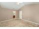 Large bedroom with vaulted ceiling and ensuite bathroom at 119 Lookout Point Pl, Mooresville, NC 28115