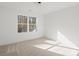 Bright bedroom with neutral walls, carpeted floors and a double window at 1479 Earl St, Hickory, NC 28602