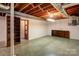 Spacious unfinished basement with built-in shelving units at 236 Sidesmur Ne Ct, Concord, NC 28025