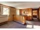 Basement bar with wood cabinetry and a built-in counter at 236 Sidesmur Ne Ct, Concord, NC 28025