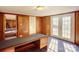 Spacious basement with wood paneling, and French doors at 236 Sidesmur Ne Ct, Concord, NC 28025