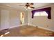 Hardwood floor bedroom with access to a full bathroom at 236 Sidesmur Ne Ct, Concord, NC 28025