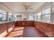 Bright sunroom with brick walls and terracotta tile floor at 236 Sidesmur Ne Ct, Concord, NC 28025