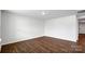 Empty living room or bonus room with wood-look flooring at 2632 Goose Fair Rd # 62, Maiden, NC 28650