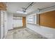 Garage with ample storage shelving and pegboard at 314 W 10Th St, Charlotte, NC 28202