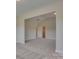 Spacious bedroom with neutral walls and carpet, featuring an ensuite bathroom and walk-in closet at 316 Coronado Ave, Matthews, NC 28104