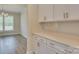 White cabinetry and quartz countertops in butlers pantry at 316 Coronado Ave, Matthews, NC 28104