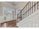 Bright entryway with hardwood floors and white trim at 316 Coronado Ave, Matthews, NC 28104