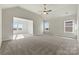 Large main bedroom with vaulted ceiling, carpeted floors, and ample natural light at 316 Coronado Ave, Matthews, NC 28104