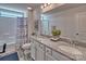 Bathroom with double vanity and granite countertop at 320 Coronado Ave # 039, Matthews, NC 28104