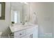 Bright bathroom with white vanity and modern fixtures at 4119 Black Ct # 168, Harrisburg, NC 28075