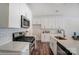 White kitchen with stainless steel appliances and subway tile backsplash at 4119 Black Ct # 168, Harrisburg, NC 28075