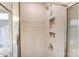 Clean shower with tile surround and built-in niche at 4125 Black Ct # 169, Harrisburg, NC 28075