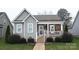 Charming two-story home with a welcoming front porch and landscaped yard at 1156 13Th Avenue Ne Cir, Hickory, NC 28601