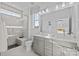 Modern bathroom with double vanity, walk-in shower, and stylish fixtures at 13005 Moon Rd # 43, Charlotte, NC 28277