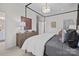 Modern bedroom with a comfortable bed and large window, with access to a closet at 13005 Moon Rd # 43, Charlotte, NC 28277
