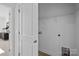 Convenient laundry room with built-in shelving and hookups at 13009 Moon Rd # 42, Charlotte, NC 28277