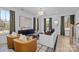 Spacious living room with two armchairs and a large sectional sofa at 13009 Moon Rd # 42, Charlotte, NC 28277