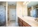 Double vanity bathroom with large tiled shower at 131 Quail Haven Dr, Troutman, NC 28166