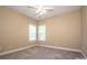 Spacious bedroom with carpeted floor and ceiling fan at 131 Quail Haven Dr, Troutman, NC 28166