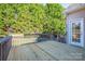 Wooden deck overlooking a fenced backyard at 131 Quail Haven Dr, Troutman, NC 28166