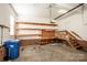 Attached garage with ample storage, workbench and room for two cars at 131 Quail Haven Dr, Troutman, NC 28166